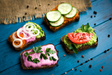 fresh vegetable vegeterian sandwiches  on the table