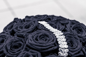 Luxury diamond jewelry bracelet and black roses flowers, love gift on Valentines Day and jewellery...