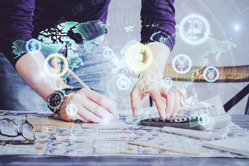 Multi exposure of man standing and planing investment with stock market forex chart.
