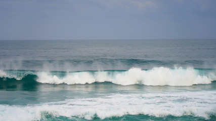ocean waves. pipe wave in the pacific ocean. clear blue water. waves for surfing