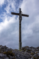 Summit Cross on top of Mount Kofel, 1342 m in Ammergauer Alps, Ostalpen, located in Oberammergau, Upper Bavaria, Germany