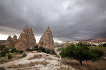 Fototapeta na wymiar Unusual rocks of volcanic rock in the Sabel Valley (Kilichlar) near the village of Goreme in the Cappadocia region in Turkey.