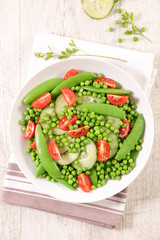 vegetable salad with pea, green bean, cucumber and tomato