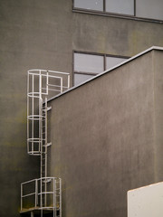 Metal fire escape stairs on an old factory building.