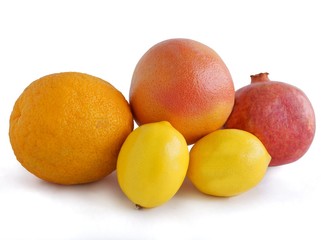 citrus fruits and juice close up