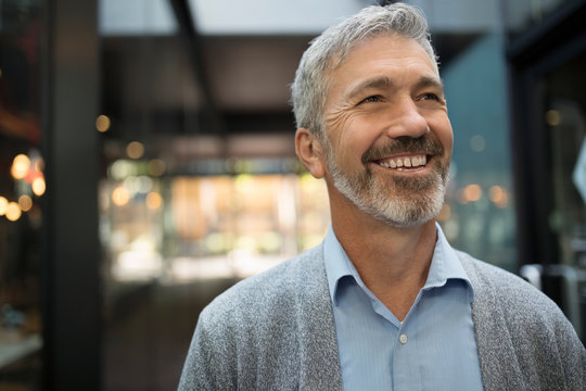 Smiling Senior Man Looking Away