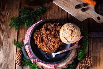 Polish bigos with sausage and dried plum