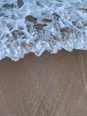sand on the beach waves sea and ocean 