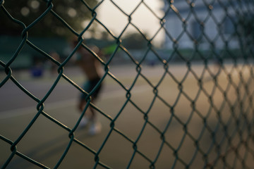 chain link fence with barbed wire