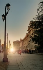 Obraz premium sunset next to the royal palace of madrid