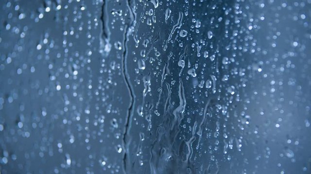 Drops of water on blue background