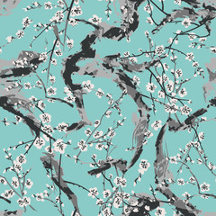 Vector Japanese sakura seamless pattern with white flowers on a blue background. Background made without clipping mask © Dasha Yurk