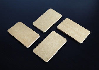 Photo of blank kraft paper business cards stacks. Template for branding identity.
