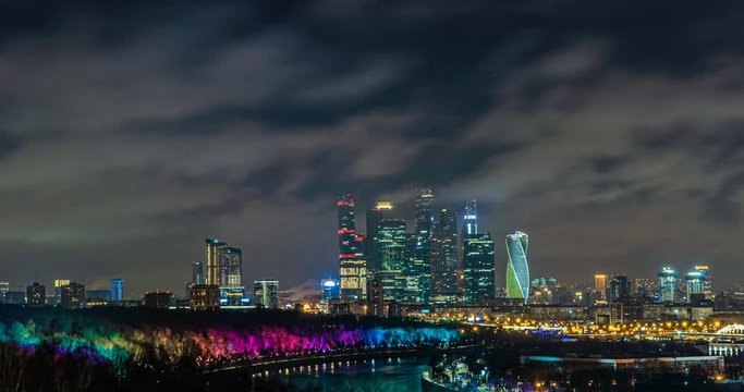 Evening Moscow, time lapse, fast flying clouds in the night sky over Moscow, 4k, beautiful evening cityscape, view from Vorobyovy Gory