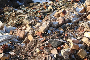 Construction waste with elements of various dismantled and destroyed old structures at municipal...