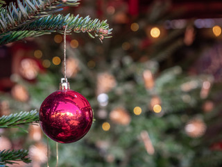 Christmas ornaments on the Christmas tree with bokeh background ball	