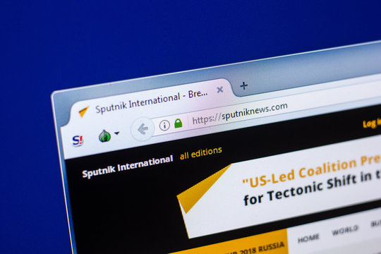 Ryazan, Russia - April 29, 2018: Homepage of Sputniknews website on the display of PC, url - Sputniknews.com