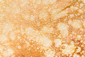 Fried pancake, textrured background - obrazy, fototapety, plakaty