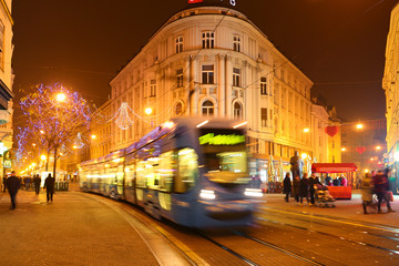 Fototapeta na wymiar Tram in Zagreb city centre at night. Jurisiceva Ulica, Zagreb, Croatia