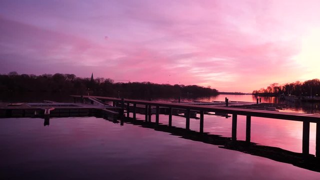 Reflection on a lake during colorful sunset, stock image, Potsdam, Germany