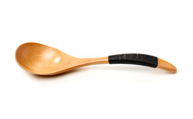 Wooden spoon isolated on white background