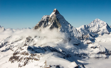 Zermatt Matterhorn and glacier view mountain winter snow landscape clouds