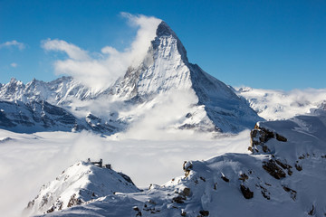 Zermatt Matterhorn gornergrat emerging from sea of clouds view perfect sky