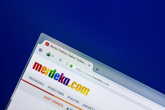 Ryazan, Russia - April 29, 2018: Homepage of Merdeka website on the display of PC, url - Merdeka.com