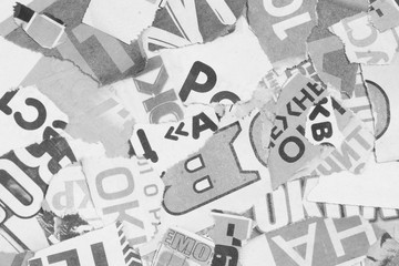 Newspaper Pages with Headlines Ripped to Small Pieces, Abstract Background Texture 