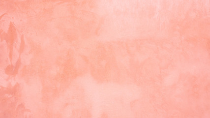 Fototapeta premium Blurred red texture on stucco.
