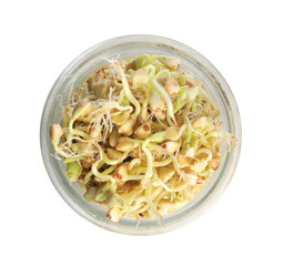 Jar of sprouted green buckwheat isolated on white, top view