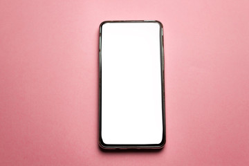 Mobile smartphone isolated on pink background