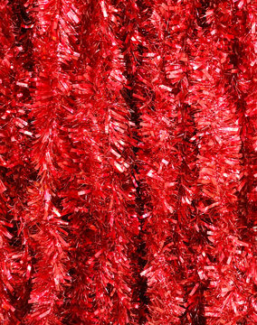 Red Tinsel In The Store As A Background