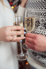 Celebration. Hands holding the glasses of champagne and wine making a toast. The party, wedding, celebration, alcohol, lifestyle, friendship, holiday, christmas, new, year and clinking concept.