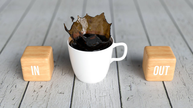 cup of coffee and cubes with text IN and OUT on wooden background