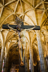 Christ on his cross during crucifixion in the Jerónimos Monastery or Hieronymites Monastery in...