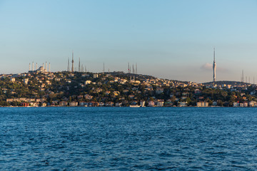 ISTANBUL TYRKEY - October, 2019. View from bosphorus strait, in the background a panorama of Istanbul - obrazy, fototapety, plakaty