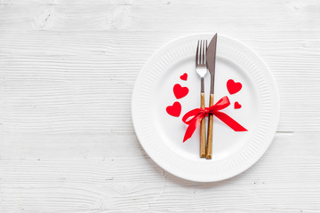 Valentines day table. Plate on grey background top-down copy space