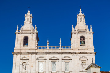 Fototapeta na wymiar The two bell towers of the Mosteiro De Sao Vicente De Fora church in Lisbon, Portugal