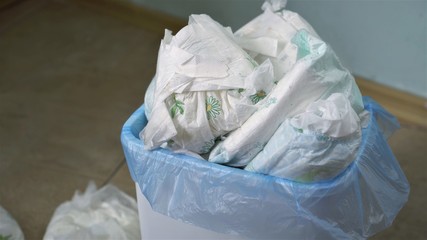 Dirty nappies in the trash