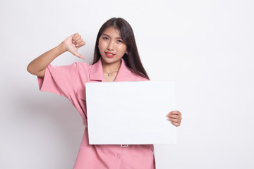Fototapeta premium Young Asian woman show thumbs down with white blank sign.