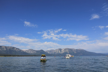 Lake at relaxing on vacation. Mountain is behind the lake.