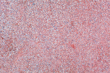 Brown texture of wet red granite Gravel. Sand and stones in water on the floor background.