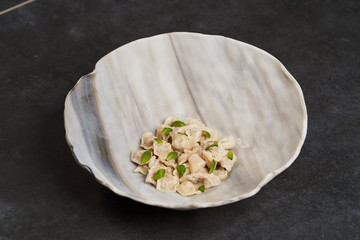 Traditional Azerbaijani cuisine, soup with small dumplings with a lot of spices