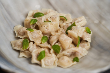 Traditional Azerbaijani cuisine, soup with small dumplings with a lot of spices