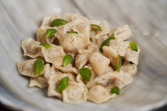 Traditional Azerbaijani cuisine, soup with small dumplings with a lot of spices