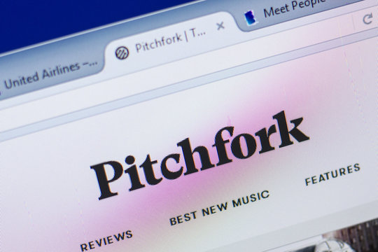 Ryazan, Russia - May 13, 2018: Pitchfork website on the display of PC, url - Pitchfork.com.