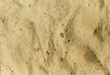Golden beach sand background and textures for resort and holiday advertisement text