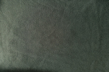 View of dark green jersey fabric from above