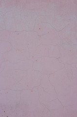 Beautiful pink  textured stucco on the wall.